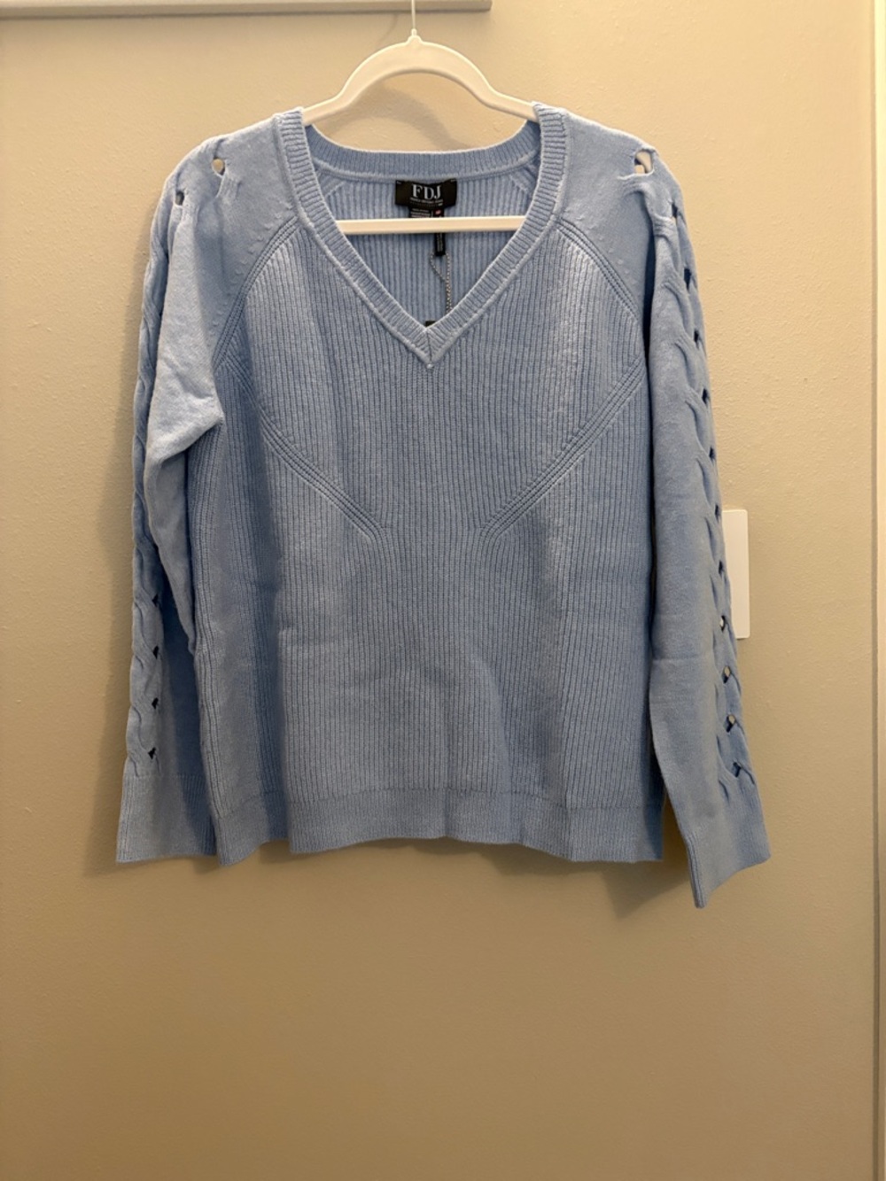 V-Neck Light Blue Knit Sweater with Lace-Up Sleeves